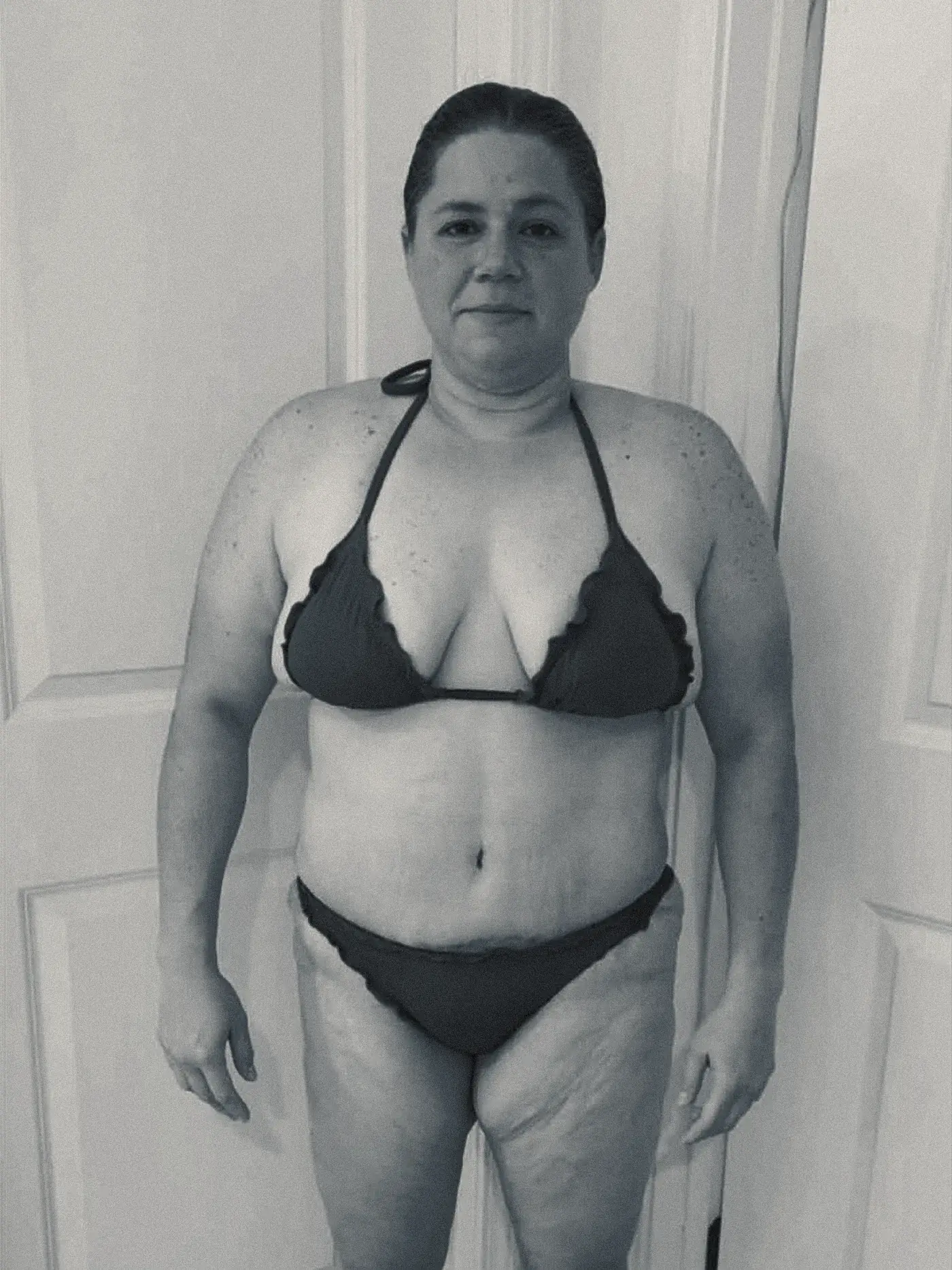 A client photographed at the start of her programme