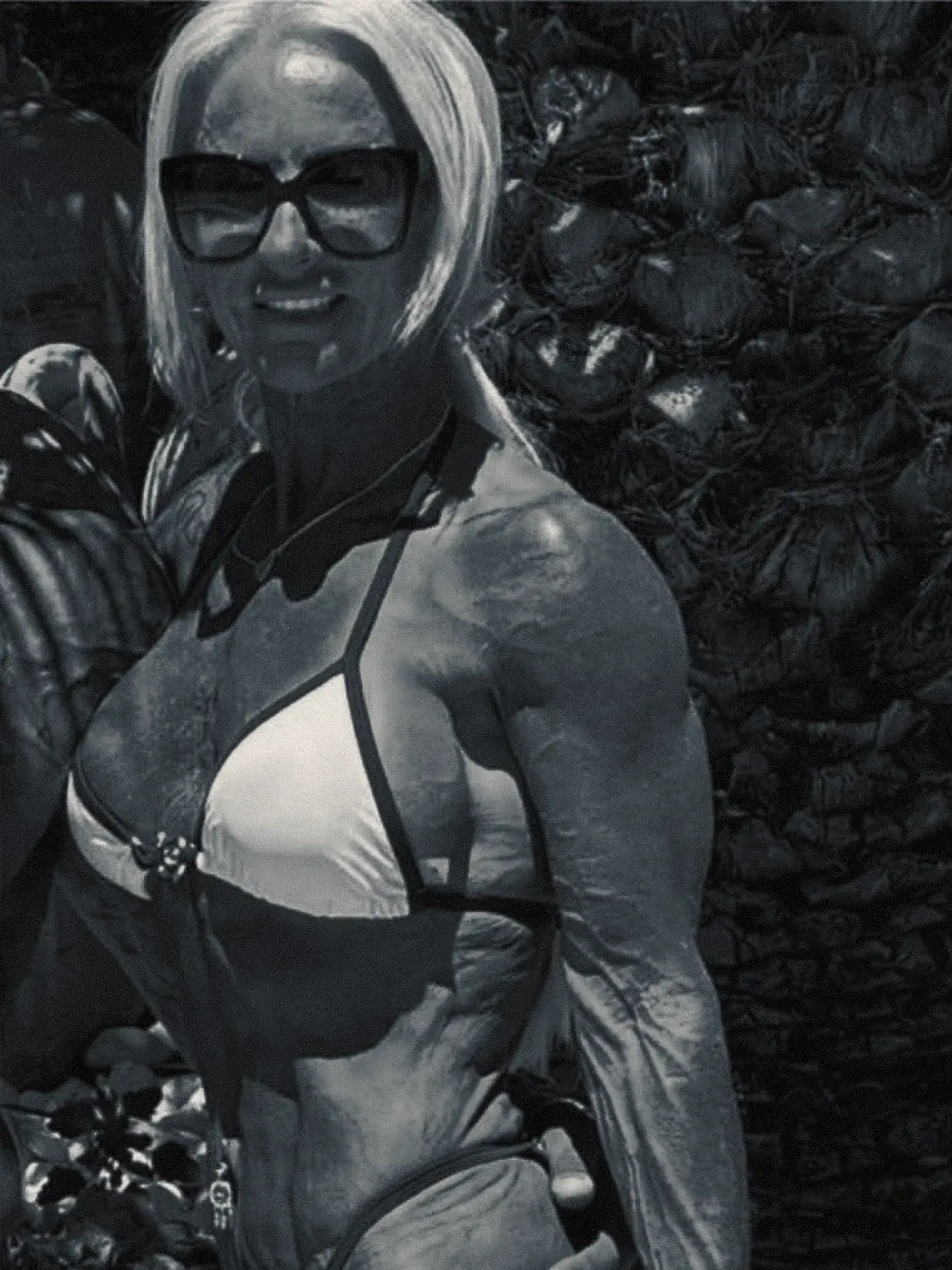 The same client afterwards, considerably leaner with far more muscle definition