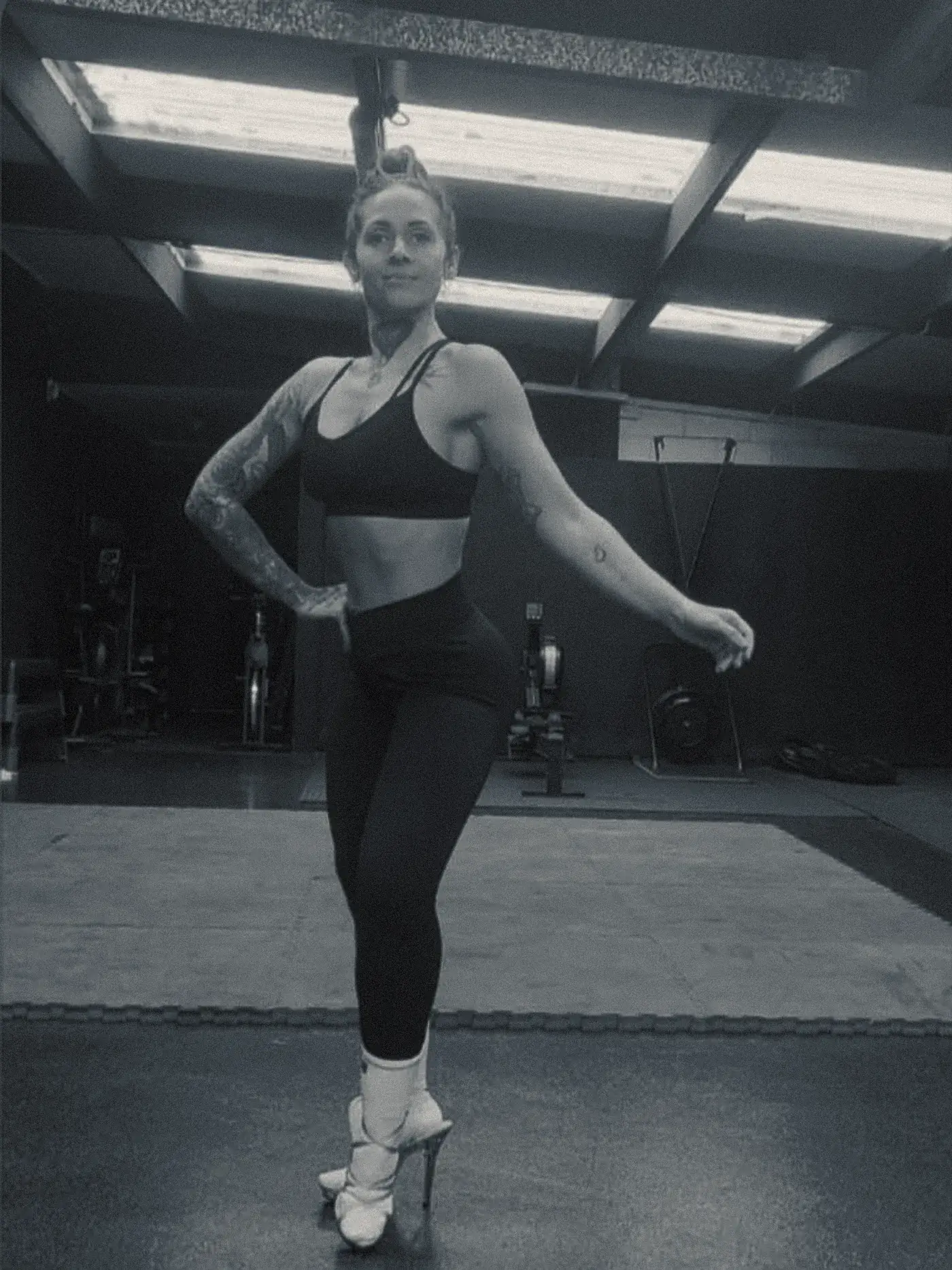 A client practising her posing early in her preparation