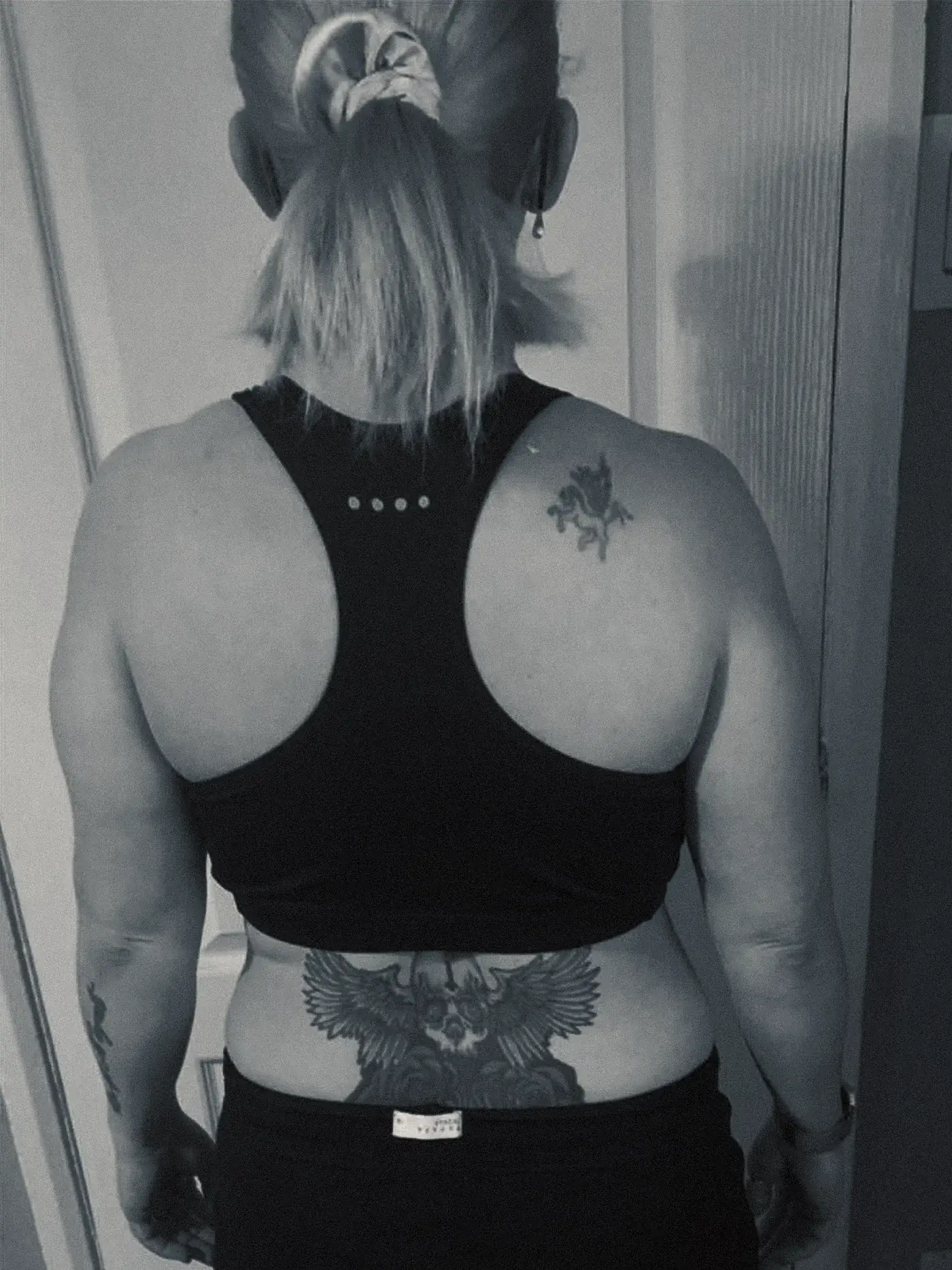 A client photographed from behind at the start of her programme