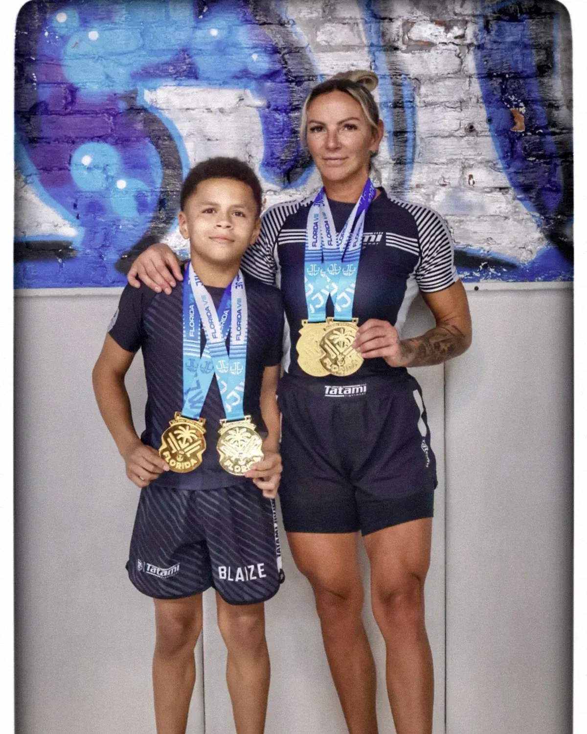 Jayne Tingle with her son, both holding gold medals won at the JJ World League Florida Open