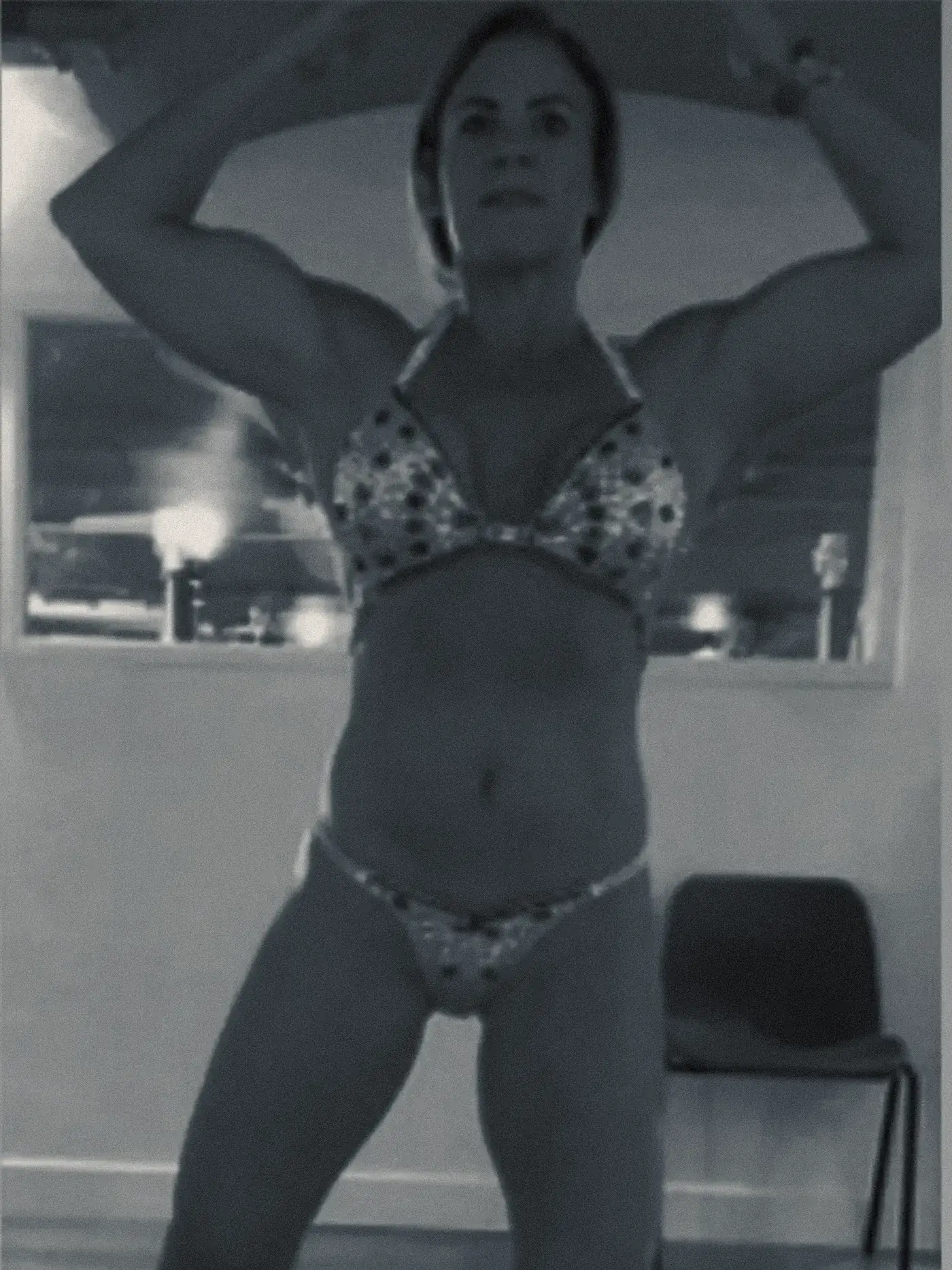 Julie practising her posing early in her preparation, before moving up through the competition classes