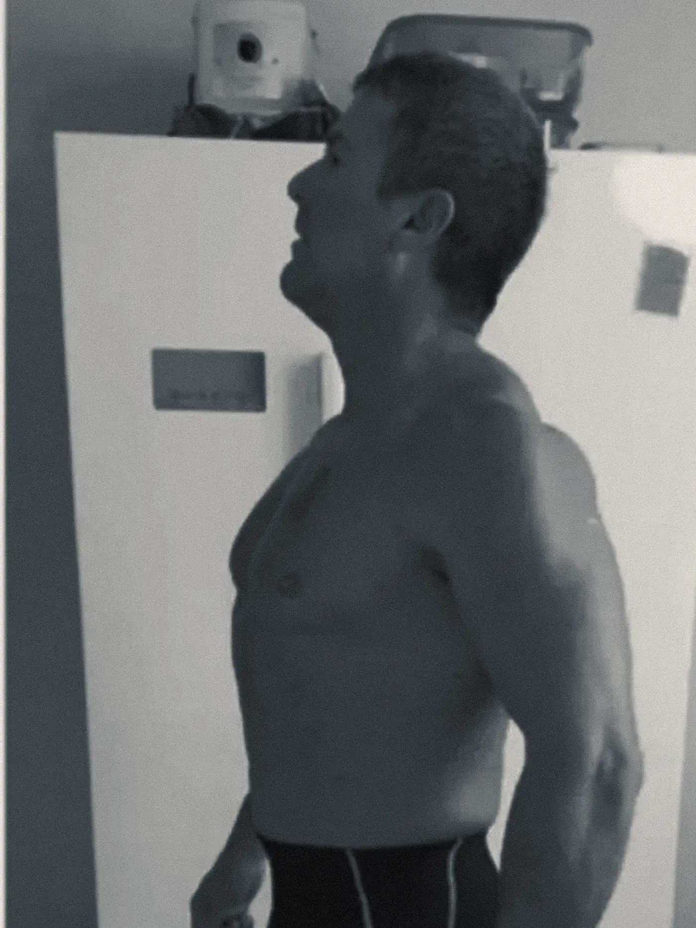 Steven at the start of his twelve week preparation, photographed side on at home before training began