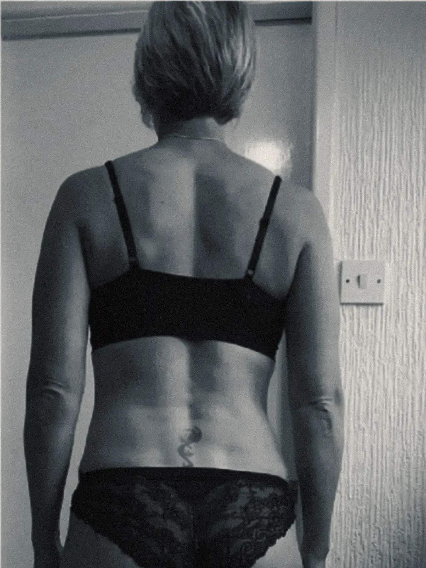 Yvonne photographed from behind at the start of her six month programme
